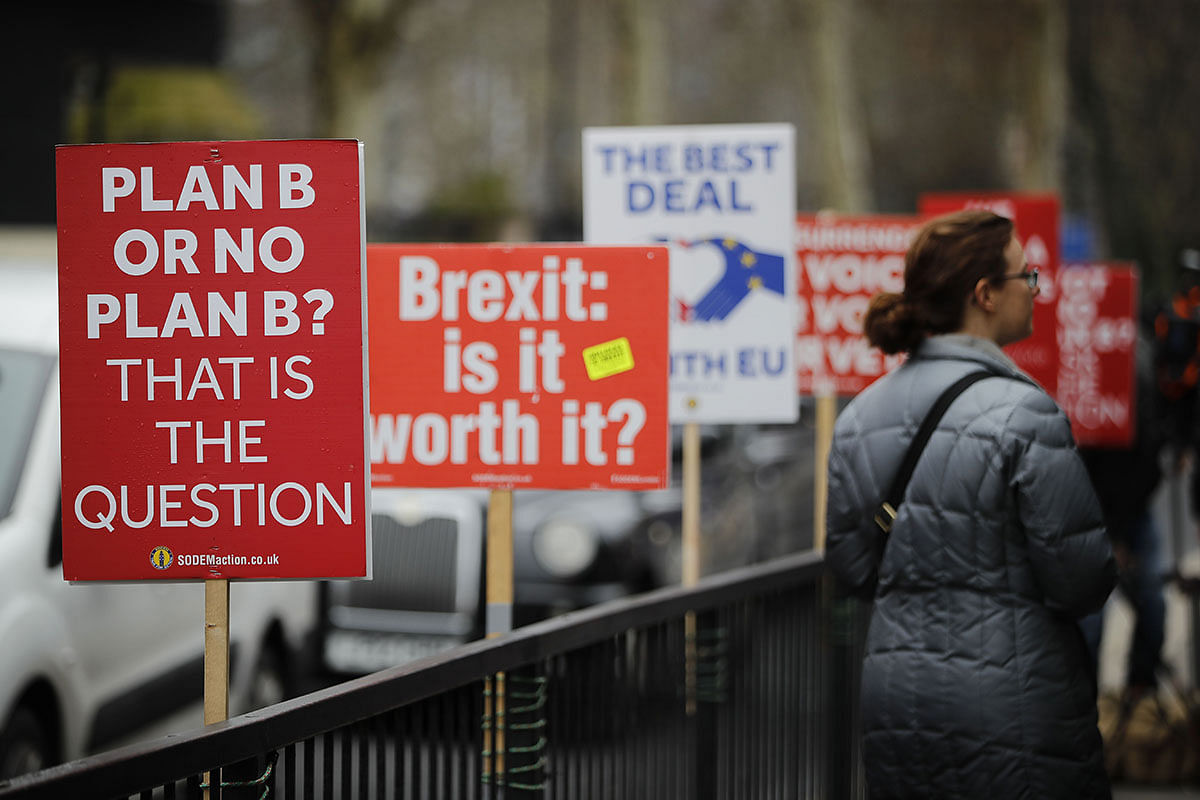 Anti-Brexit placards are set up on street furniture outside the Houses of Parliament in central London on 5 February 2019. Photo: AFP