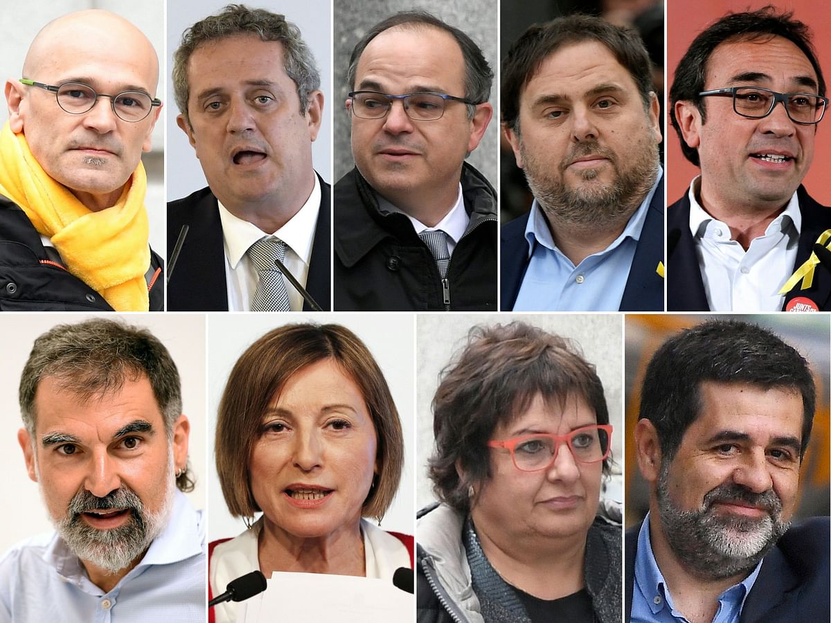 This combination of file pictures created on 26 October, 2018 shows jailed Catalan separatist leaders (TOP L-R) Raul Romeva, Joaquim Forn, Jordi Turull, Oriol Junqueras, Josep Rull (BOTTOM L-R) Jordi Cuixart, Carme Forcadell, Dolors Bassa and Jordi Sanchez. Photo: AFP