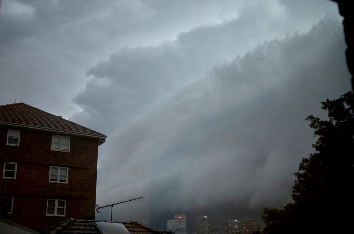 This photo taken through a window on 8 February 2019 shows storm clouds gathering over Bondi Junction in Sydney. Photo: AFP