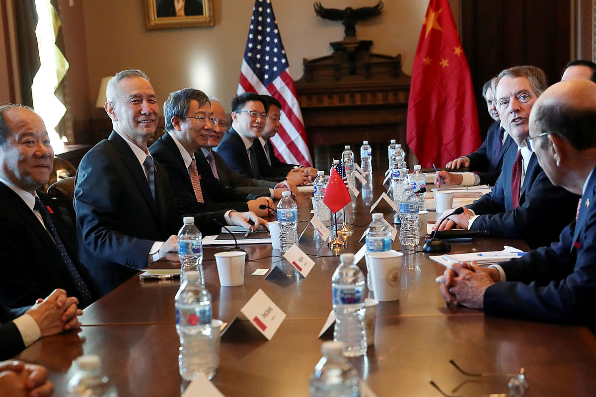 US Trade Representative Robert Lighthizer (2nd right) sits across from China`s Vice Premier Liu He (left) during the opening of US-China Trade Talks in the Eisenhower Executive Office Building at the White House in Washington, US, on 30 January 2019. Reuters File Photo