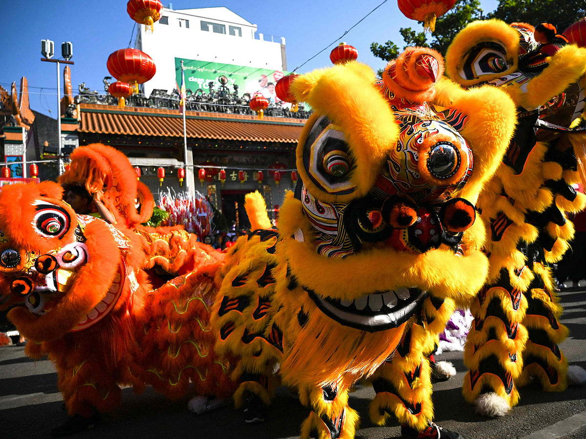 Lion dancers perform during Lunar New Year celebrations in Yangon on 5 February 2019. Photo: AFP