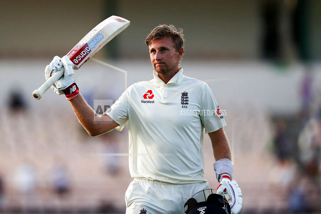 England`s captain Joe Root raises his bat as he leaves the field after day three of the third cricket Test match against West Indies at the Daren Sammy Cricket Ground in Gros Islet, St. Lucia, Monday, 11 February 2019. Photo: AP