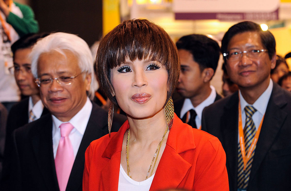 This picture taken on 24 March, 2010 shows Thai princess Ubolratana Rajakanya visiting the Thailand pavilion at the Hong Kong Entertainment Expo. Thai princess to run for prime minister with Shinawatra party: party official said on 8 February. Photo: AFP