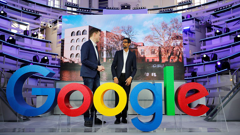Google CEO Sundar Pichai and Philipp Justus, Google vice president for Central Europe and the German-speaking Countries, stand by a Google logo during the opening of the new Alphabet’s Google Berlin office in Berlin, Germany, 22 January 2019. Photo: Reuters