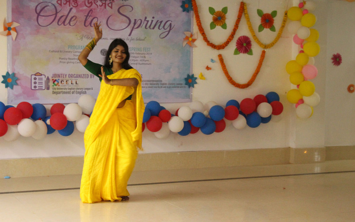 An English department student dances at a cultural programme, Ode to Spring, organised by City University English Literary Lounge (CELL) and the English department at the central auditorium of the university at Savar, Dhaka on 13 February. Photo: Collected