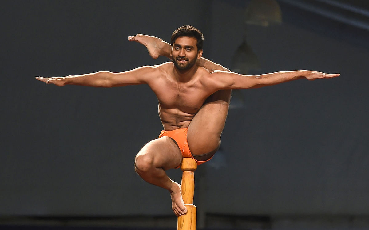In this photo taken on 16 February 2019, an Indian gymnast performs at the Mallakhamb World Championships in Mumbai. Some 100 competitors from 15 different countries take part in the Mallakhamb World Championships in India`s financial capital of Mumbai on 16-17 February. Mallakhamb is a gymnastics-like discipline that originated in western India in the 12th century and is often described as `yoga on a pole`. Photo: AFP