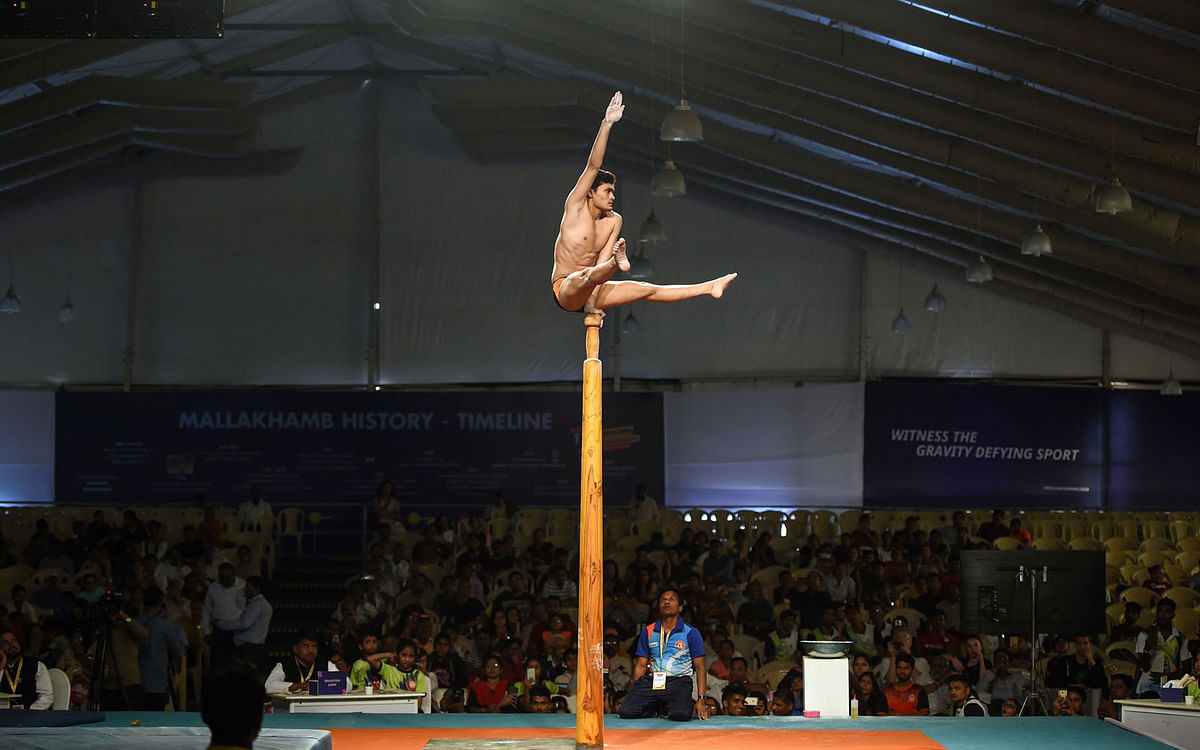 In this photo taken on 16 February 2019, an Indian gymnast performs at the Mallakhamb World Championships in Mumbai. Photo: AFP