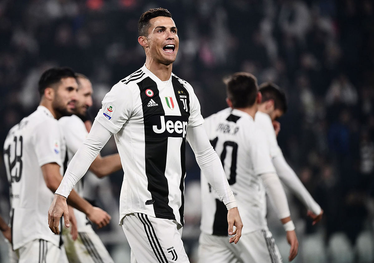 Juventus` Portuguese forward Cristiano Ronaldo celebrates after scoring during the Italian Serie A football match Juventus vs Frosinone on 15 February 2019 at the Juventus stadium in Turin. Photo: AFP