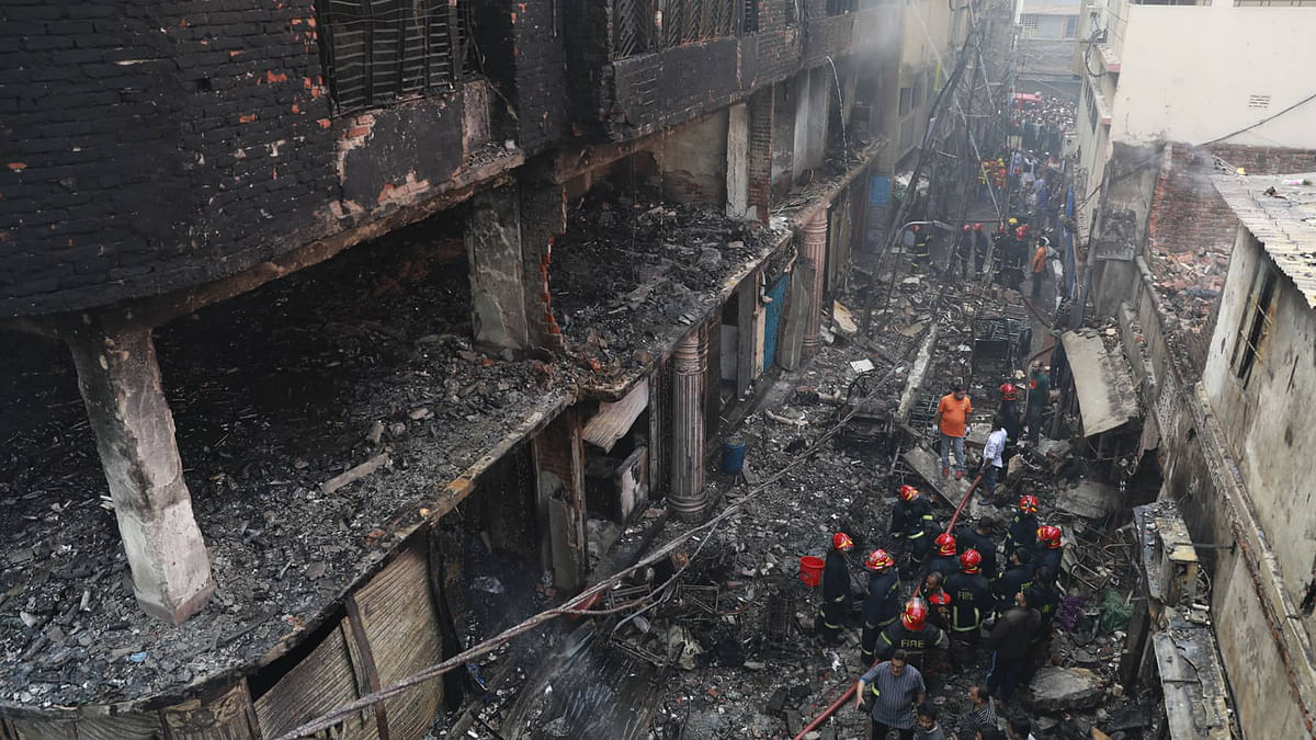 This photo taken on Thursday morning shows a building burnt in a fire that breaks out in a five-storey building in Chawkbazar area at Old Dhaka on 20 February. Photo: Prothom Alo