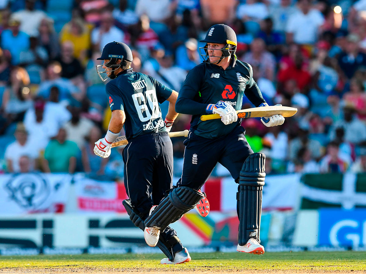 Jason Roy (R) and Joe Root (L) of England 100 partnership during the 1st ODI between West Indies and England at Kensington Oval, Bridgetown, Barbados, on 20 February 2019. Photo: AFP