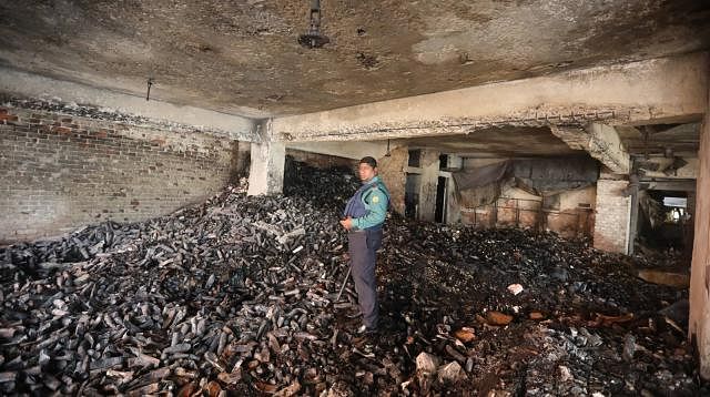 Pile of destroyed cans inside the building. Photo: Abdus Salam