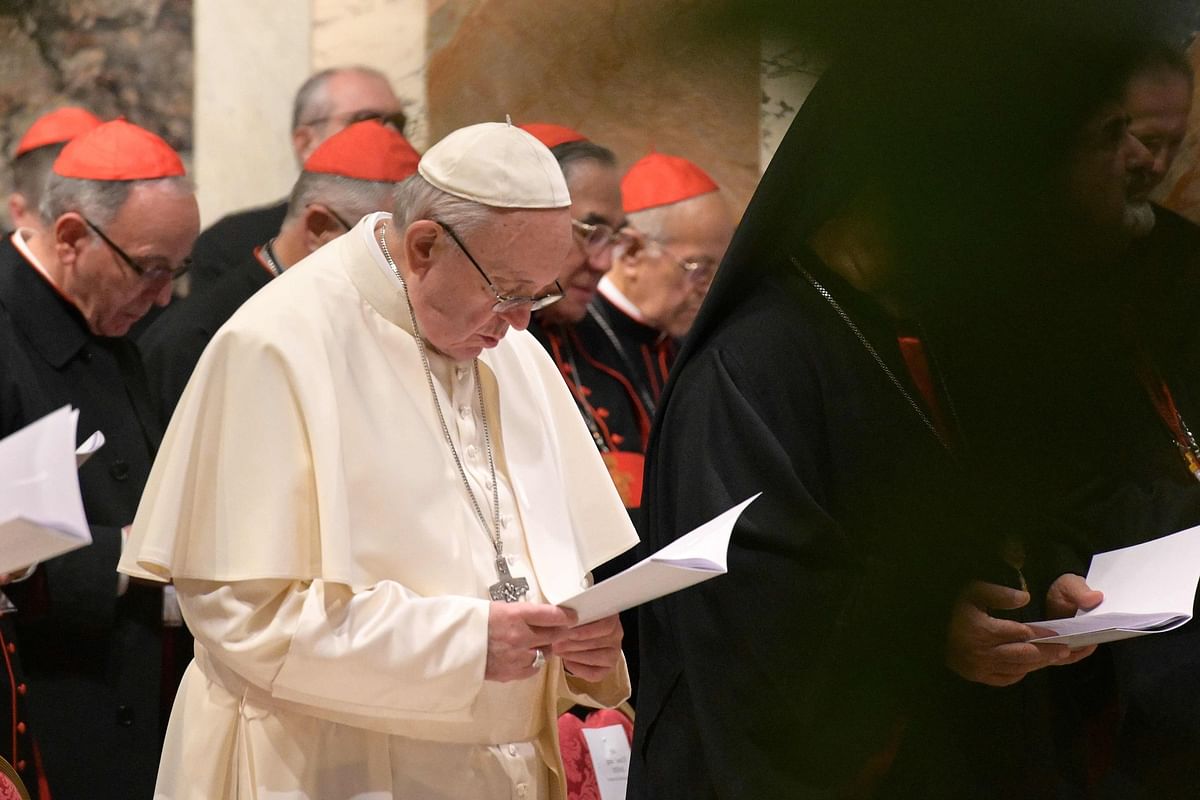 Pope Francis takes part in a liturgical prayer along with cardinals within the third day of a landmark Vatican summit on tackling paedophilia in the clergy, on 23 February at the Vatican. Photo: AFP