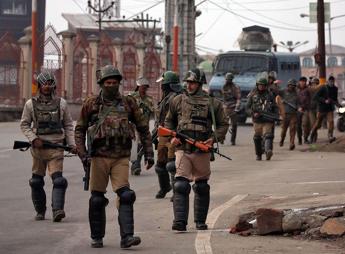Indian Central Reserve Police Force (CRPF) personnel patrol a street in downtown Srinagar on 23 February 2019. Photo: Reuters