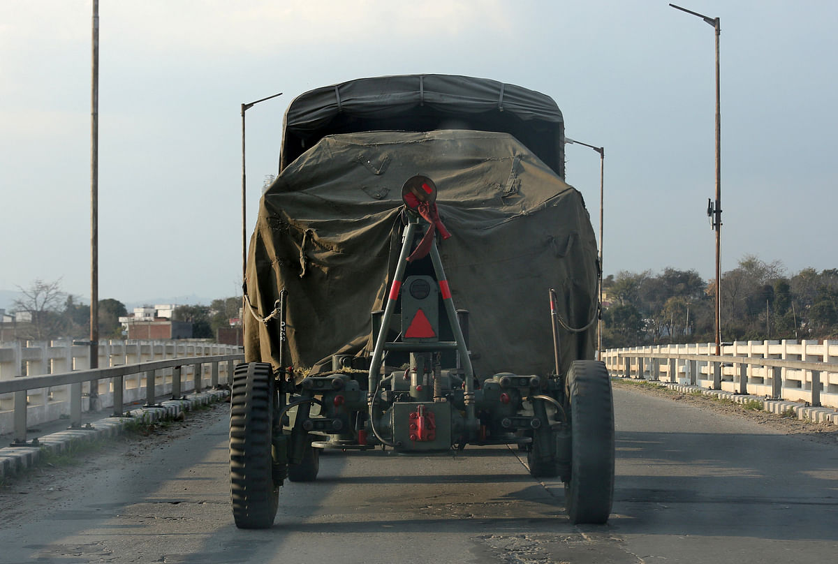 An Indian army artillery vehicle drives on a highway near Jammu. Photo: Reuters