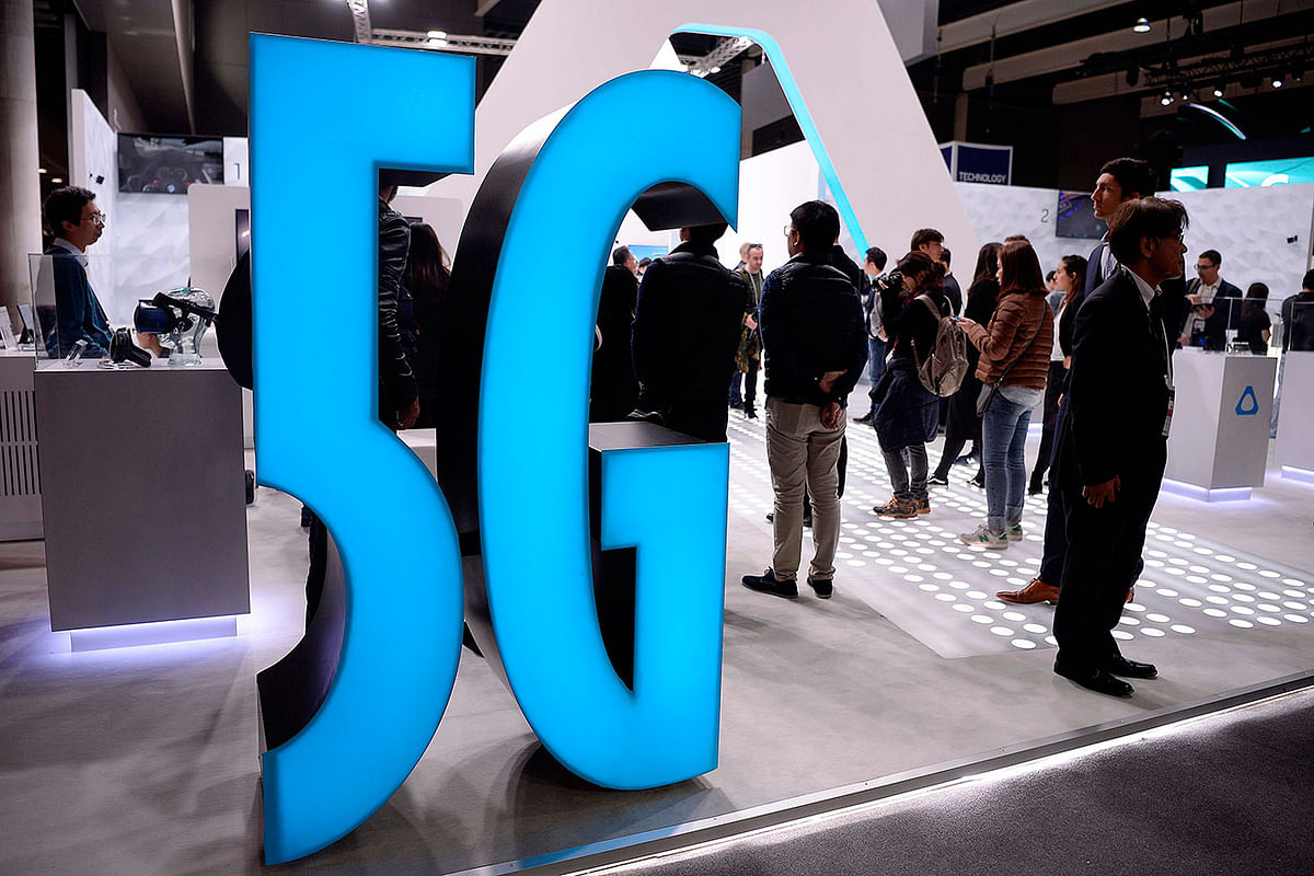 A 5G sign is displayed at a stand at the Mobile World Congress (MWC) in Barcelona on 25 February 2019. Photo: AFP