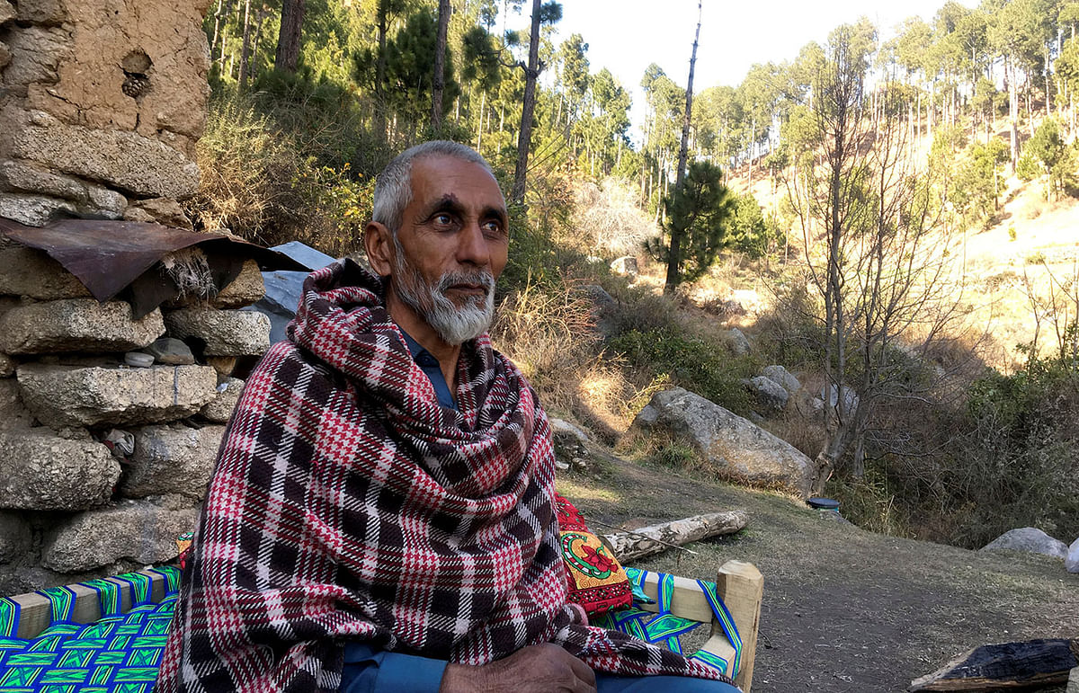 Nooran Shah, 62, talks during an interview with Reuters outside his home which is near to the site where Indian military aircrafts released payload in Jaba village, Balakot, Pakistan on 28 February 2019. Photo: Reuters