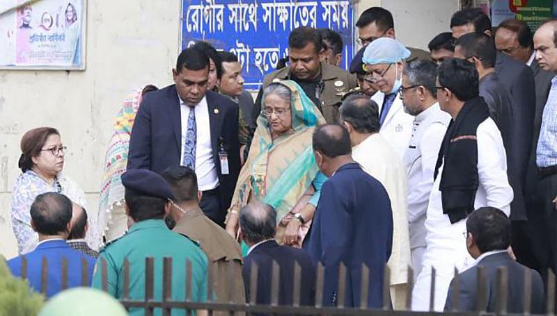 Prime minister Sheikh Hasina visits Awami League general secretary Obaidul Quader at BSMMU on Sunday. Photo: Shuvra Kanti Das