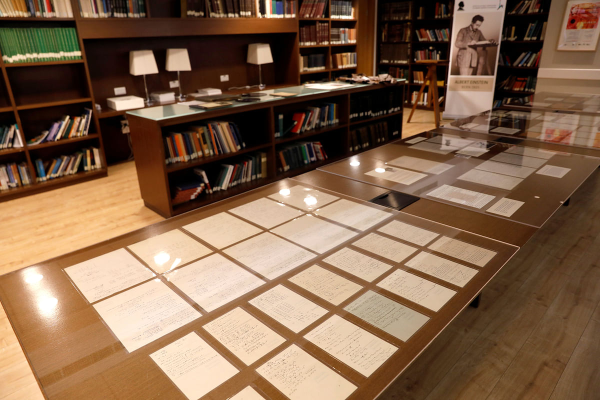 Part of a collection of 110 manuscript pages written by Albert Einstein that were unveiled by Israel`s Hebrew University are seen on display at the university in Jerusalem. Photo: Reuters