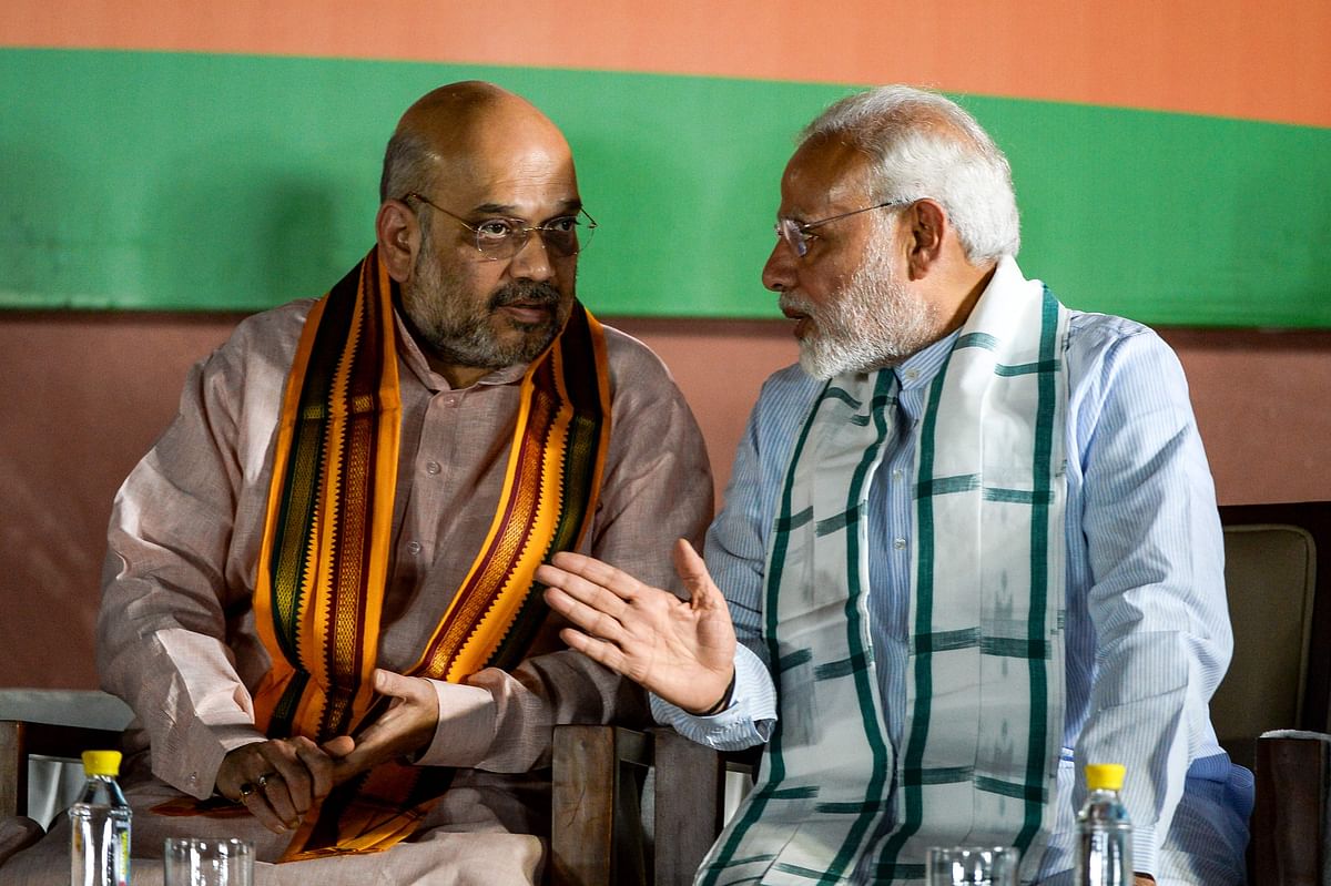 In this AFP file photo taken on 15 May 2018, Indian prime minister Narendra Modi (R) and Bhartiya Janta Party president Amit Shah