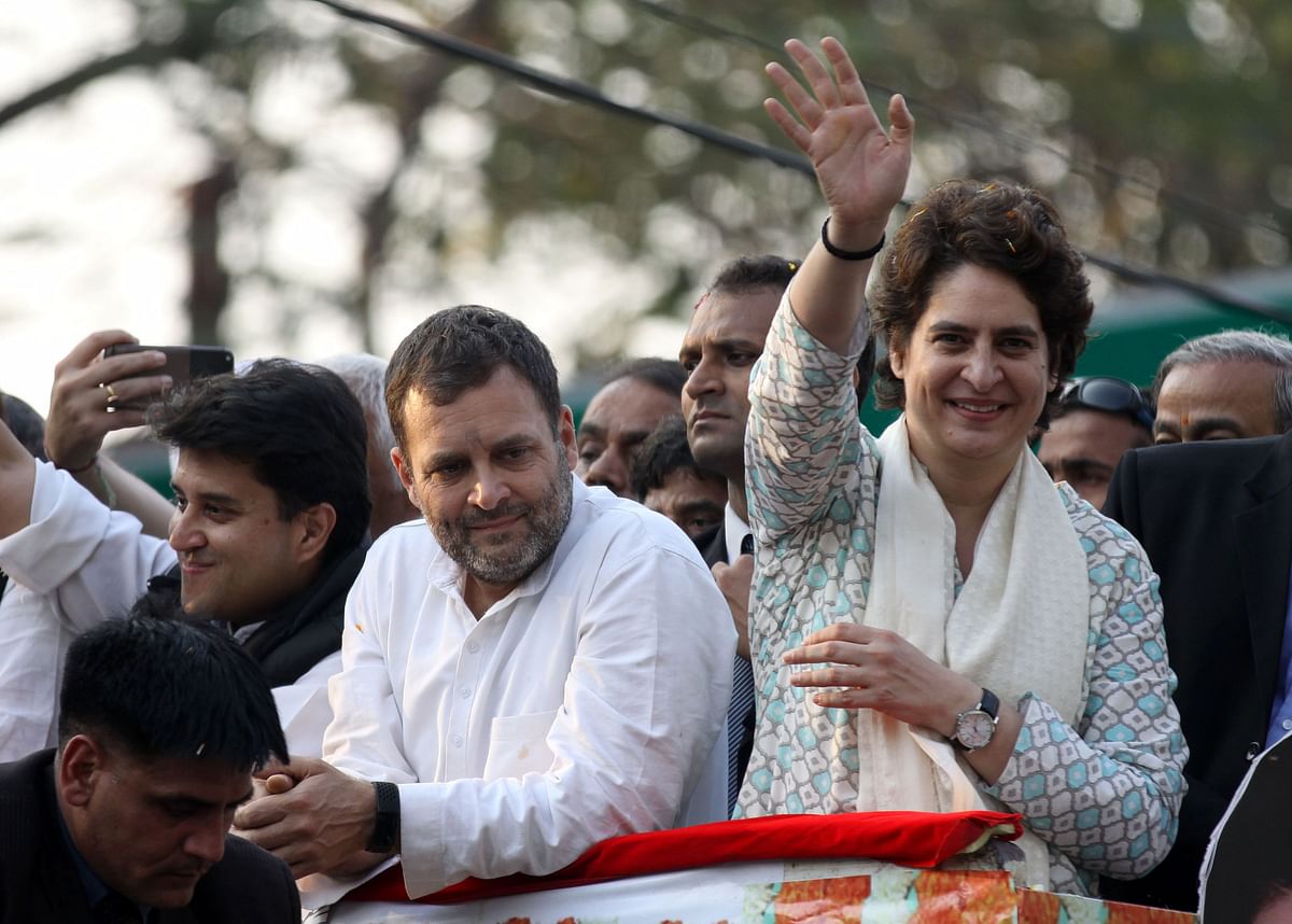 In this AFP file photo taken on 11 February 2019 Indian Congress Party leader Rahul Gandhi (L) looks on at a political rally as his sister Priyanka Gandhi Vadra (R)
