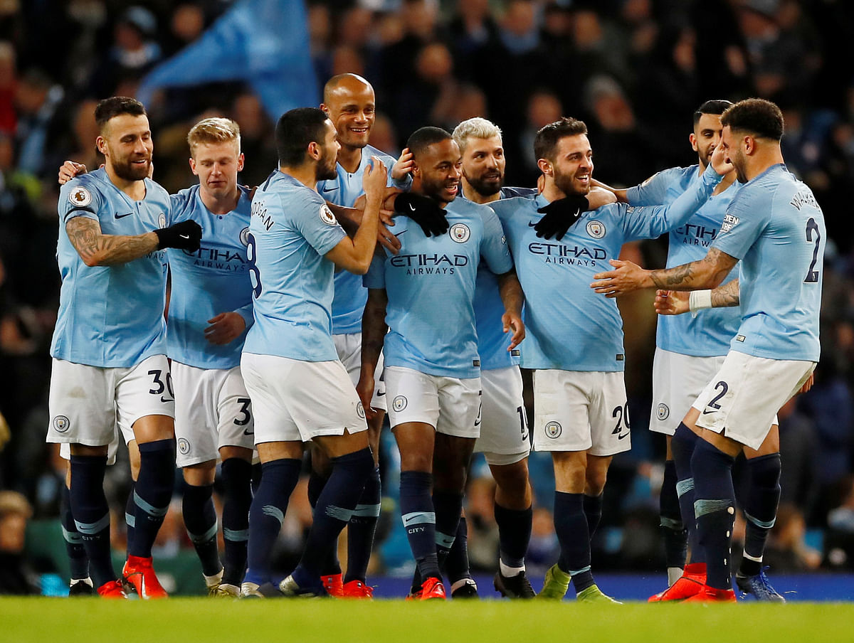 Manchester City`s Raheem Sterling celebrates with team mates scoring their first goal in a Premier League match against Watford at Etihad Stadium, Manchester, Britain on 9 March 2019. Photo: Reuters