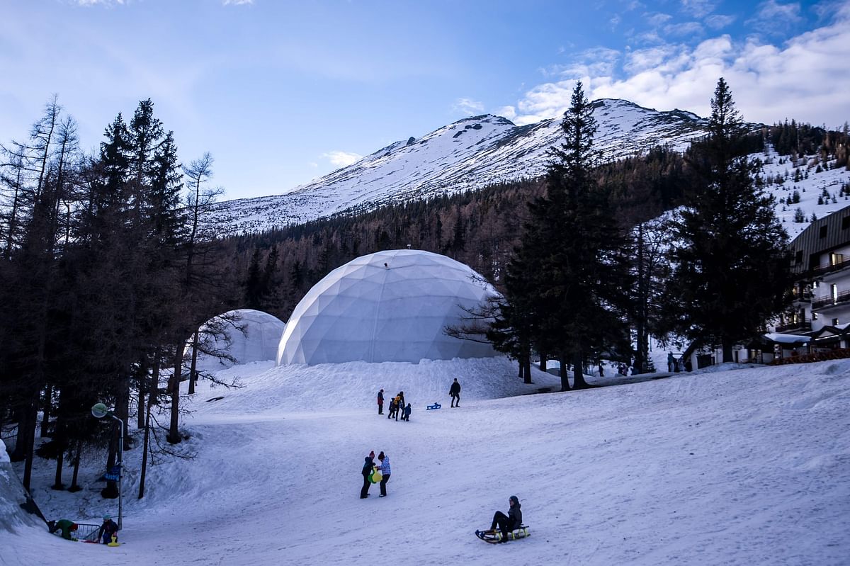 Tourists sledge in front of Tatra Ice Temples at Hrebienok, High Tatras mountains resort in eastern Slovakia on 27 February 2019. Photo: AFP