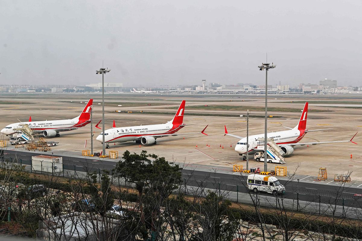This photo taken on 11 March 2019 shows three Boeing 737 MAX 8 planes from Shanghai Airlines parked at Shanghai Hongqiao International Airport in Shanghai. Photo: AFP