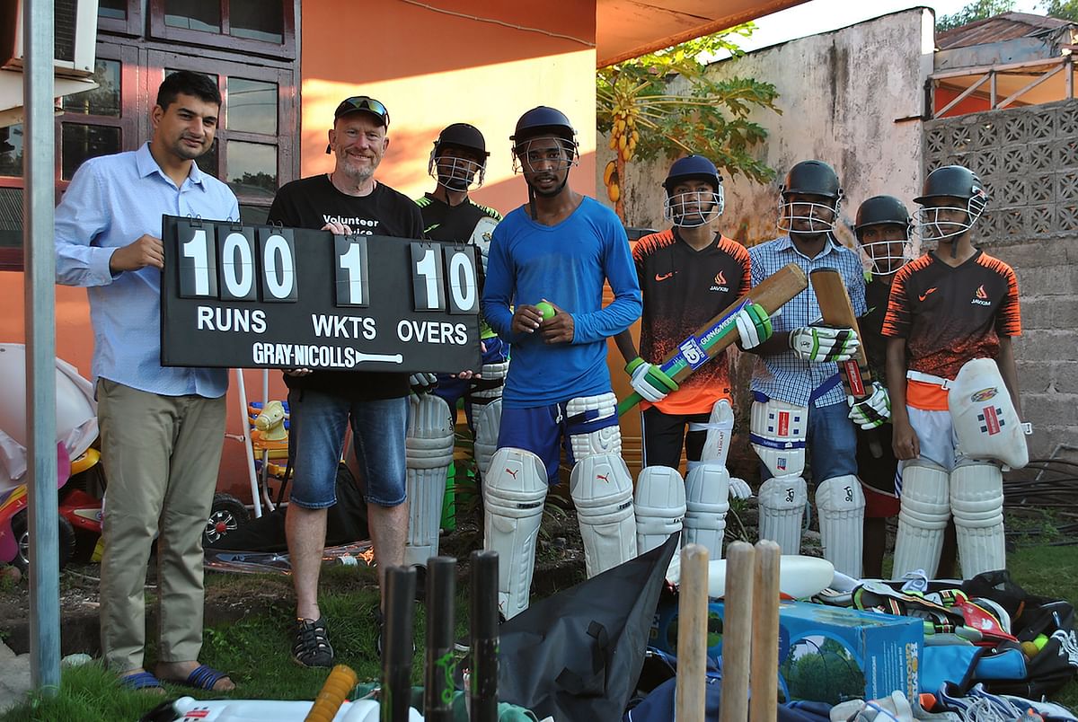 This undated handout picture released on 11 March 2019 by the Timor Leste Cricket Association shows local youth receiving new cricket equipment in Dili, the capital of East Timor. Photo: AFP
