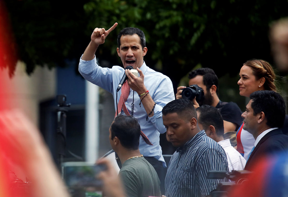 Venezuelan opposition leader Juan Guaido, who many nations have recognised as the country`s rightful interim ruler, speaks to the crowd during a protest against Venezuelan president Nicolas Maduro`s government in Caracas, Venezuela on 12 March. Photo: Reuters