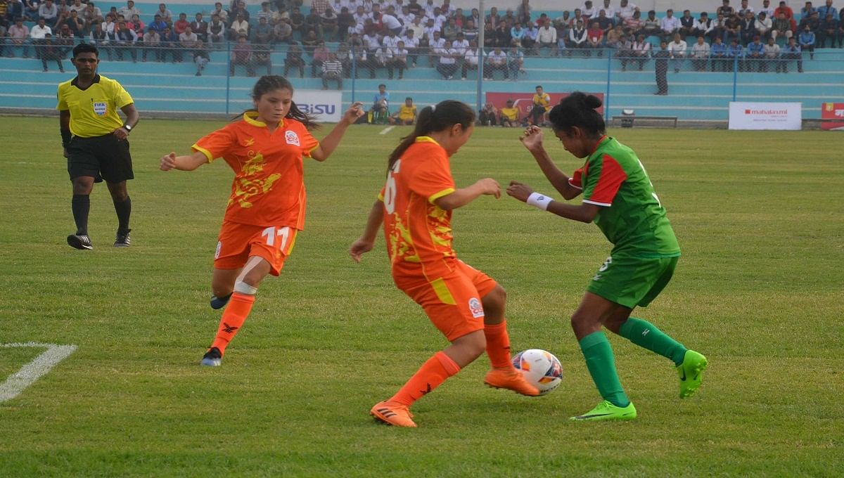 Bangladesh National Women’s Football team smartly reach the semifinals of the six-team SAFF Women’s Championship from Group A eliminating Himalayan nation Bhutan by 2-0 goals in their first match at the Shahid Rangashala in Biratnagar, Nepal on Thursday. Photo: UNB/Courtesy