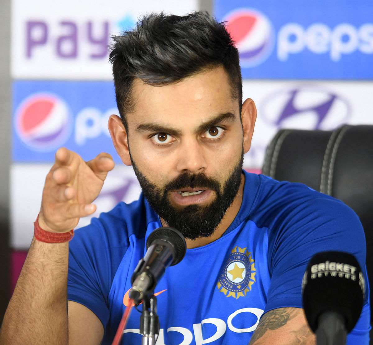 In this file photo taken on 1 March, 2019, Indian cricket team captain Virat Kohli speaks at a press conference ahead of the first one day international (ODI) cricket match between India and Australia at the Rajiv Gandhi International Cricket Stadium in Hyderabad. Virat Kohli is not panicking about the World Cup despite India being ravaged in the media for their first one-day series defeat at home since 2015 at the hands of a resurgent Australia. -- Photo: AFP
