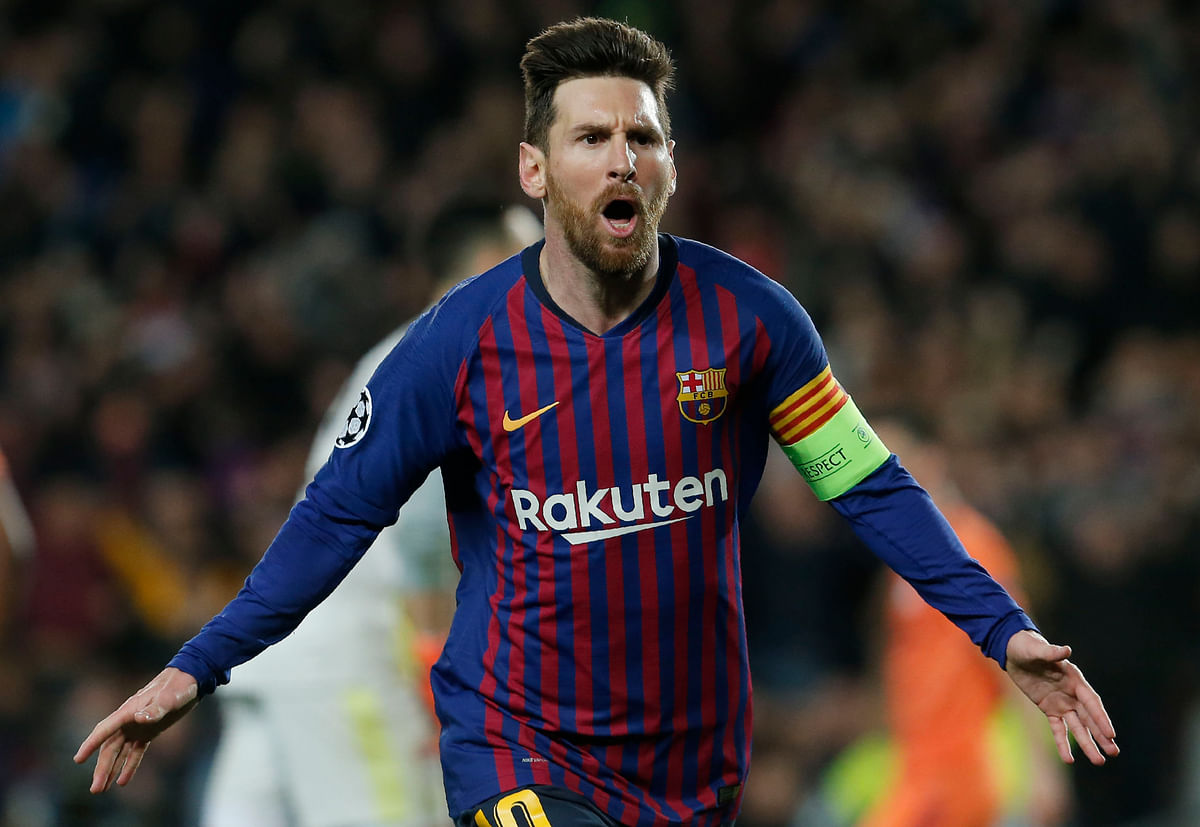 Barcelona's Argentinian forward Lionel Messi celebrates after scoring during the UEFA Champions League round of 16, second leg football match between FC Barcelona and Olympique Lyonnais at the Camp Nou stadium in Barcelona on 13 March, 2019. Photo: AFP