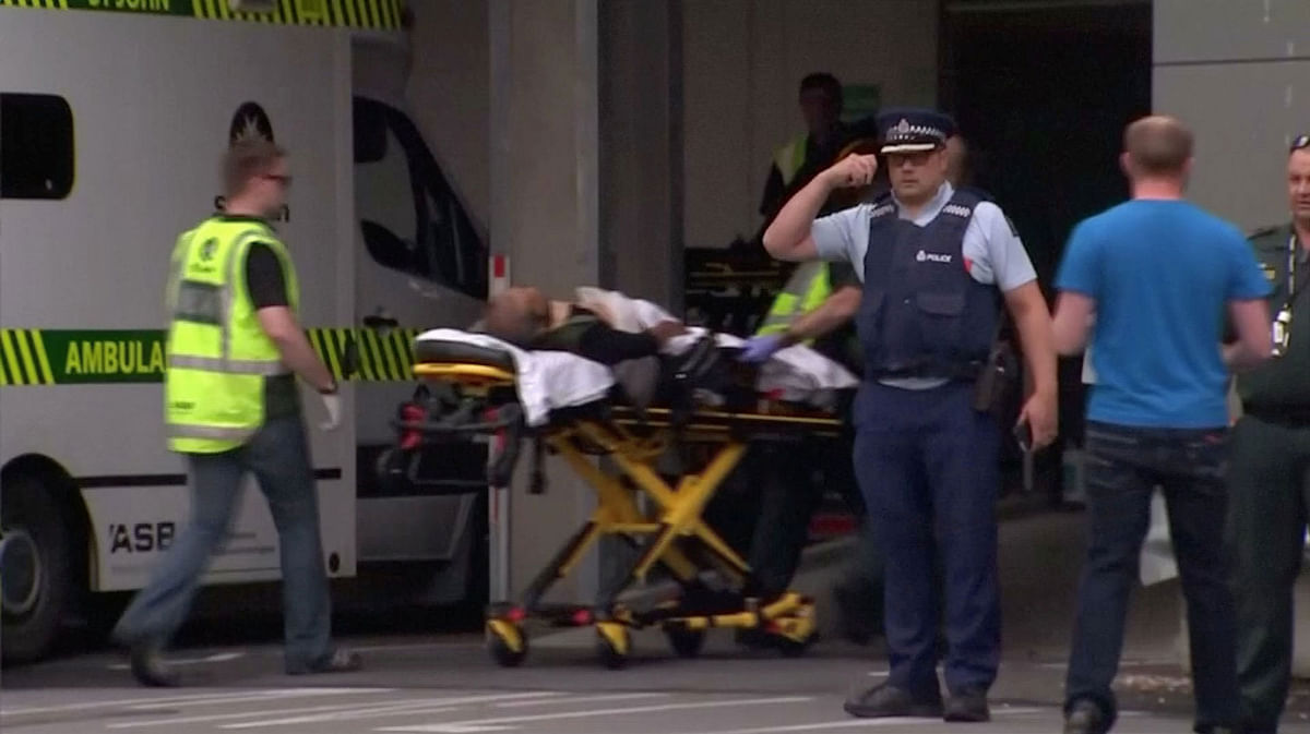 Video grab of emergency services personnel transport a stretcher carrying a person at a hospital, after reports that several shots had been fired, in central Christchurch. Photo: Reuters