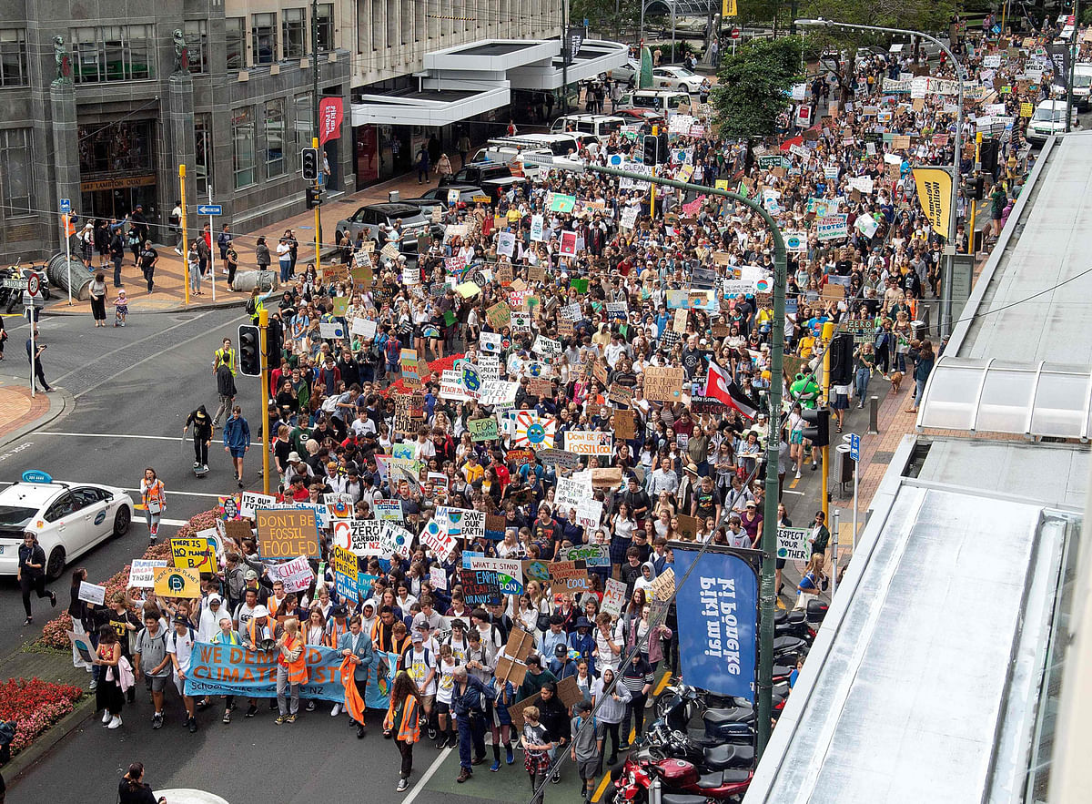 School children march up Lambton Quay to Parliament during a strike and protest by students highlighting inadequate progress to address climate change at Civic Square in Wellington on 15 March 2019. Photo: AFP