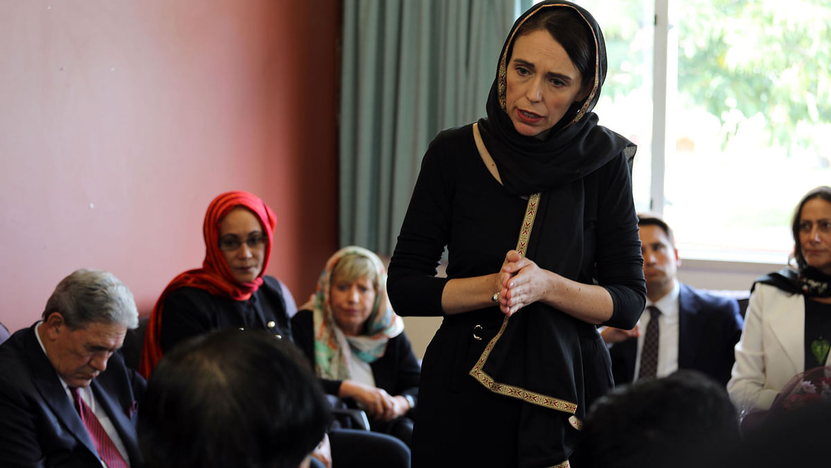 This hand out picture released by the office of New Zealand prime minister shows New Zealand prime minister Jacinda Ardern meeting with the representatives of the refugee centre during a visit to the Canterbury Refugee Centre in Christchurch on 16 March 2019. Photo: AFP