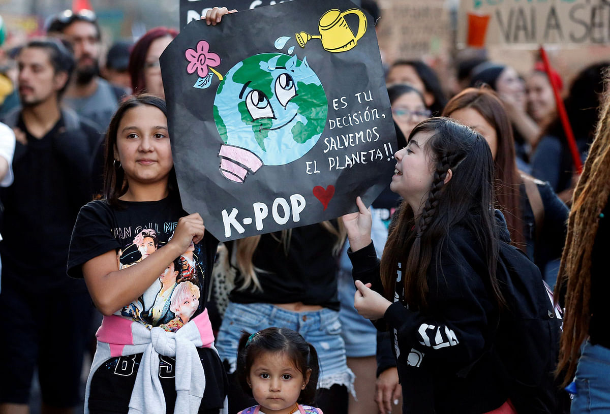 Demonstrators take part in a protest against climate change in Valparaiso, Chile on 15 March. Photo: Reuters