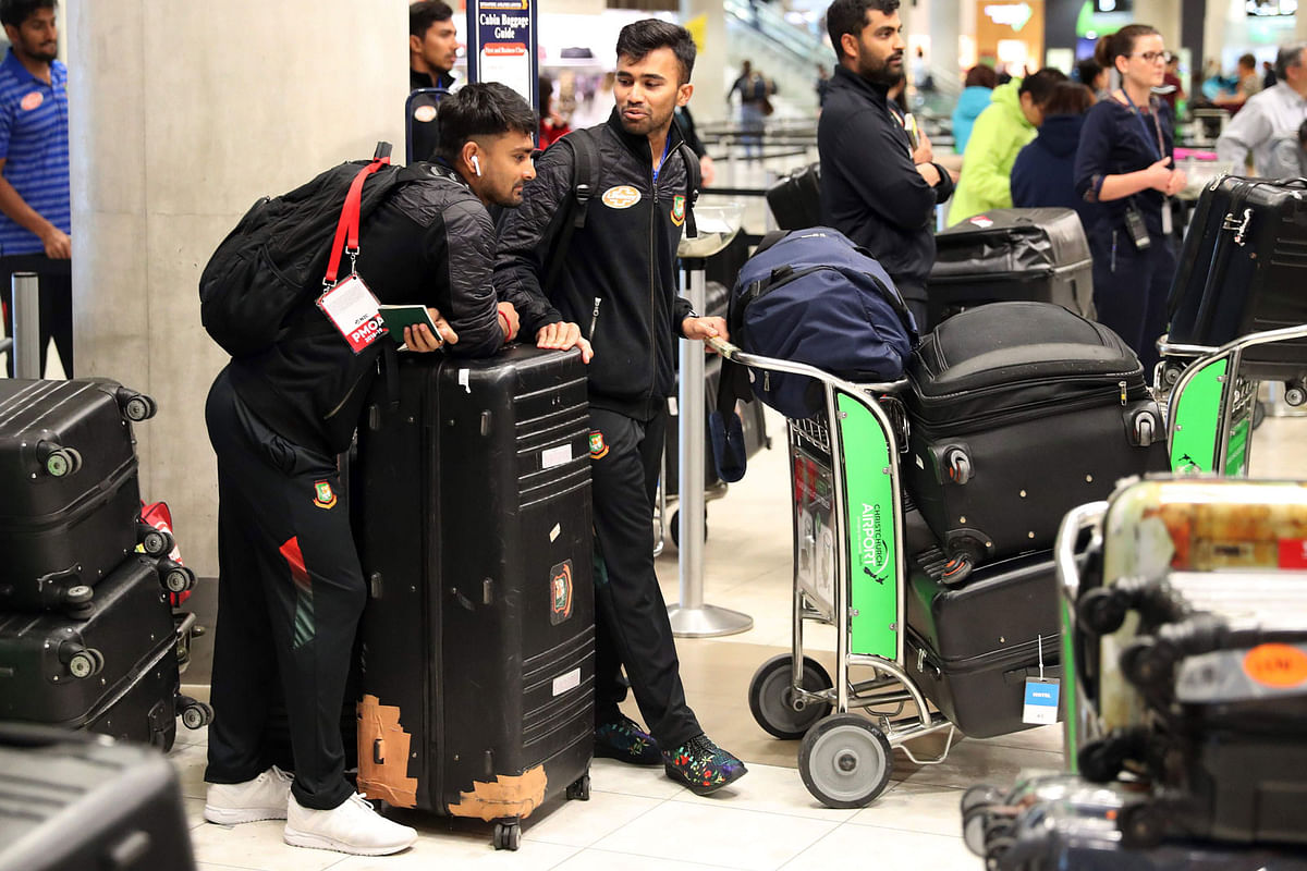 Members of the Bangladesh cricket team check into Christchurch Airport as they look the leave on 16 March 2018 following the deadly massacre on two mosques in the city. Photo: AFP