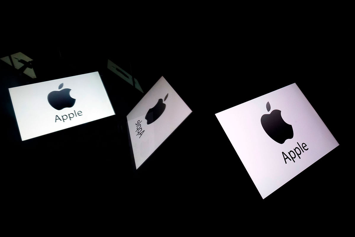 In this file photo taken on 16 February 2019 this illustration picture shows the US multinational technology company Apple logo displayed on a tablet in Paris. Photo: AFP