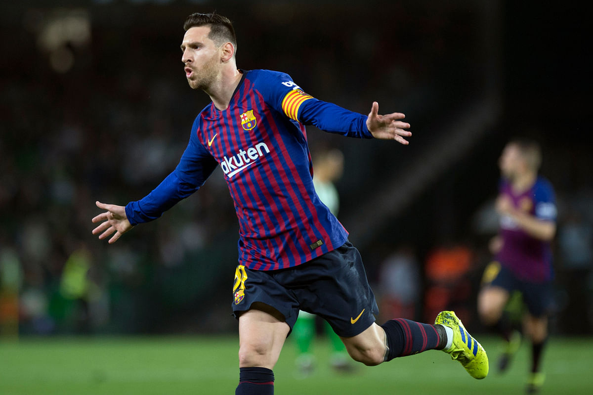 Barcelona`s Argentinian forward Lionel Messi celebrates his third goal during the Spanish league football match between Real Betis and FC Barcelona at the Benito Villamarin stadium in Seville on 17 March 2019. Photo: AFP