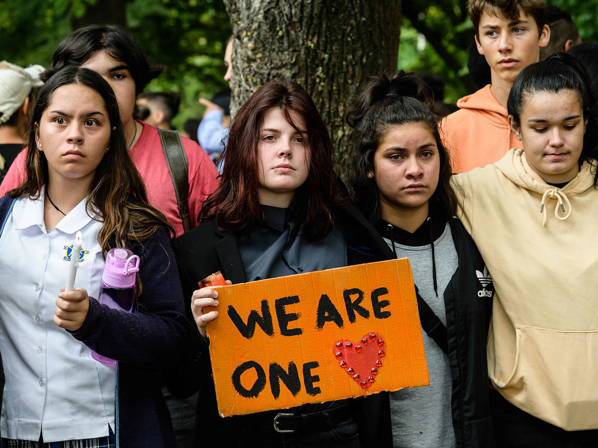 Students attend a vigil in Christchurch on 18 March 2019, three days after a shooting incident at two mosques in the city. Photo: AFP