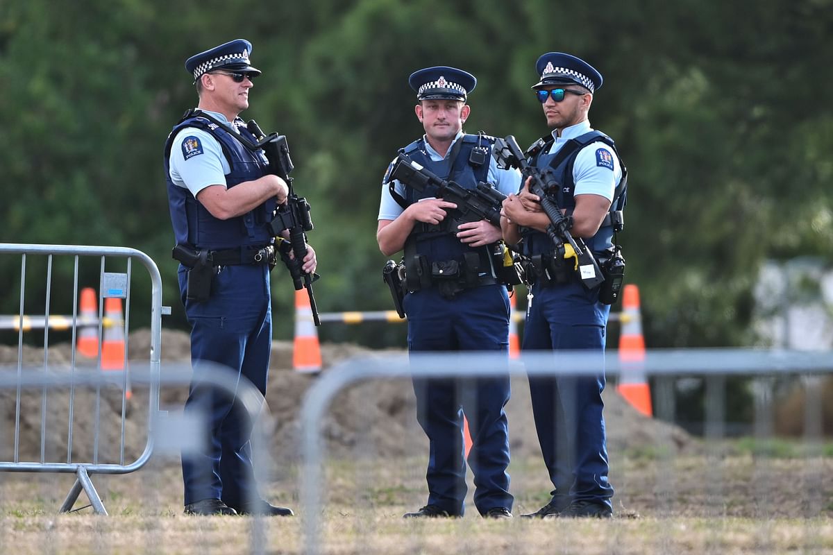 Armed Police patrol the burial ground where funerals for victims are set to take place, on March 20, 2019, in Christchurch, five days after the mass shooting attacks at two mosques that killed 50 Muslim worshippers in the city. AFP