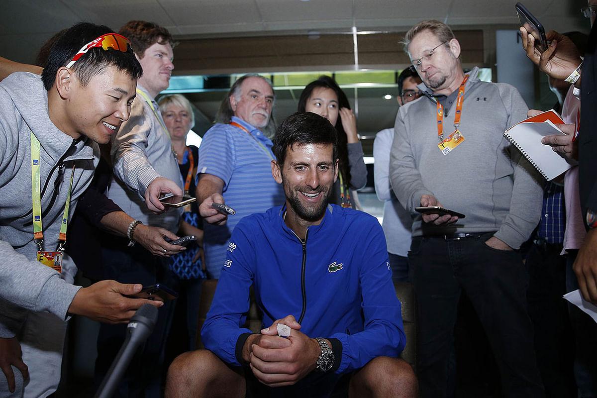 Novak Djokovic of Serbia fields questions from the media at a player availability session on Day 3 of the Miami Open Presented by Itau on March 20, 2019 in Miami Gardens, Florida. AFP