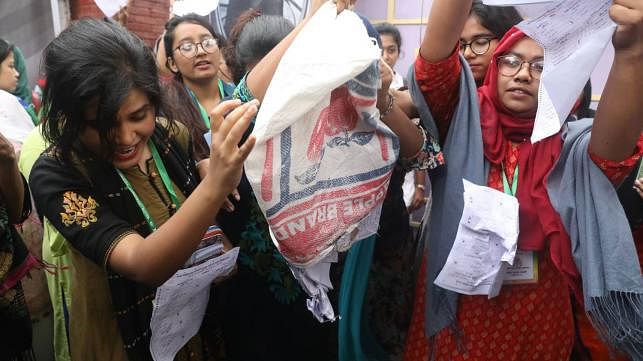 Students recover sacks filled with stamped ballot papers at the reading room of Bangladesh Kuwait-Maitree Hall before DUCSU polls voting began on 11 March. Photo: Dipu Malakar