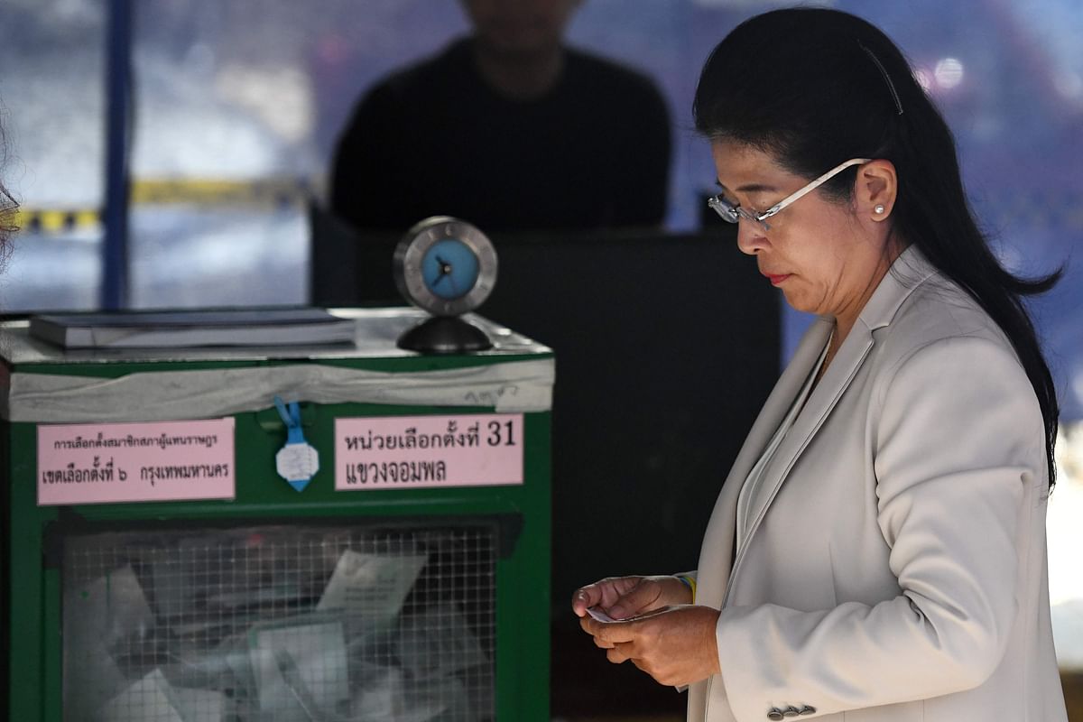 Pheu Thai party`s candidate for prime minister Sudarat Keyuraphan prepares to cast her ballot at a polling station in Bangkok on 24 March 2019 during Thailand`s general election. Photo: AFP