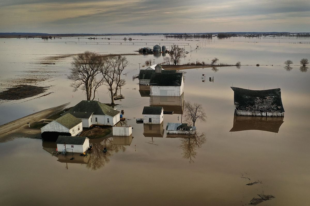 Floodwater surrounds a farm on 22 March, 2019 near Craig, Missouri. Midwest states are battling some of the worst floodings they have experienced in decades as rain and snowmelt from the recent `bomb cyclone` has inundated rivers and streams. Photo: AFP