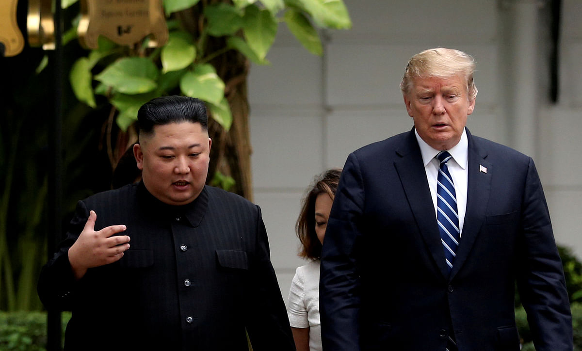 North Korea`s leader Kim Jong Un and US president Donald Trump talk in the garden of the Metropole hotel during the second North Korea-US summit in Hanoi, Vietnam on 28 February. Reuters File Photo