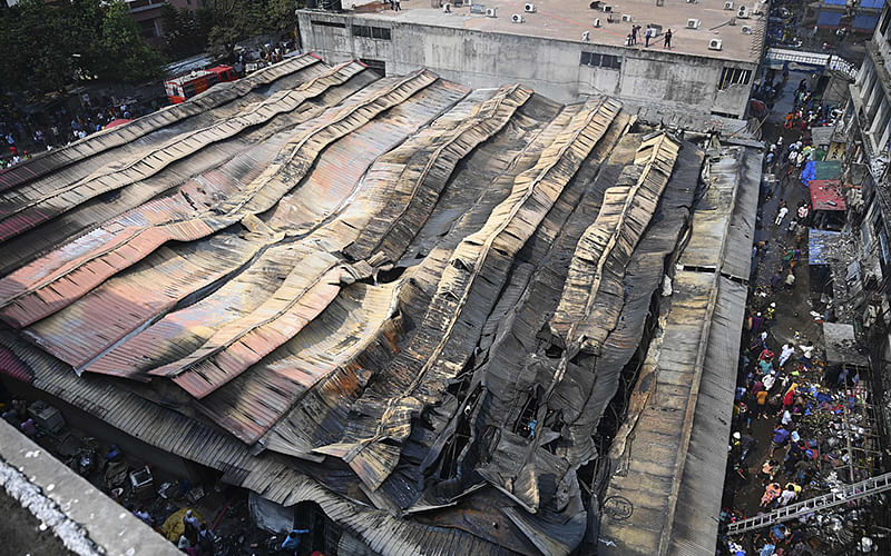 A general view of a burnt makeshift market is pictured in Dhaka on 30 March, 2019. Photo: AFP