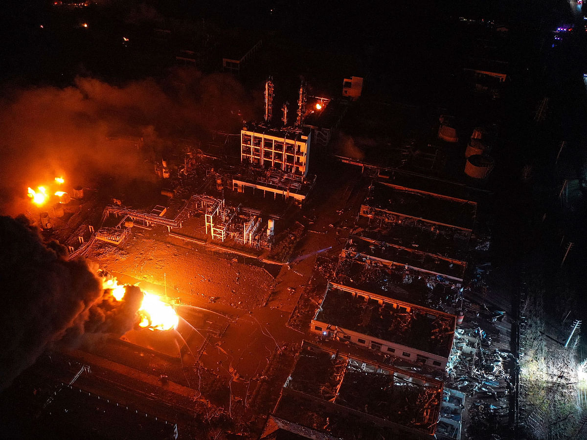 In this 21 March 2019, aerial photo released by China's Xinhua News Agency, fires burn at the site of a factory explosion in a chemical industrial park in Xiangshui County of Yancheng in eastern China's Jiangsu province. AP File Photo