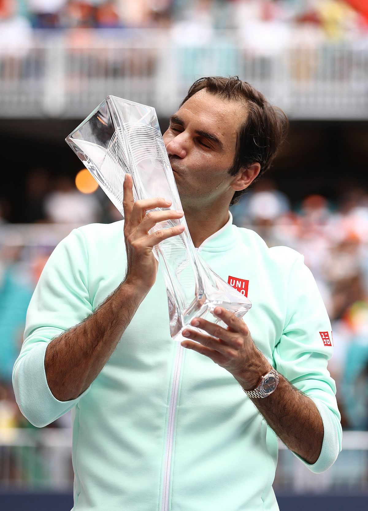 Roger Federer of Switzerland poses with the winners trophy after defeating John Isner in straight sets during the Men`s Final match on day 14 of the Miami Open presented by Itau at Hard Rock Stadium on 31 March 2019 in Miami Gardens, Florida. Photo: AFP