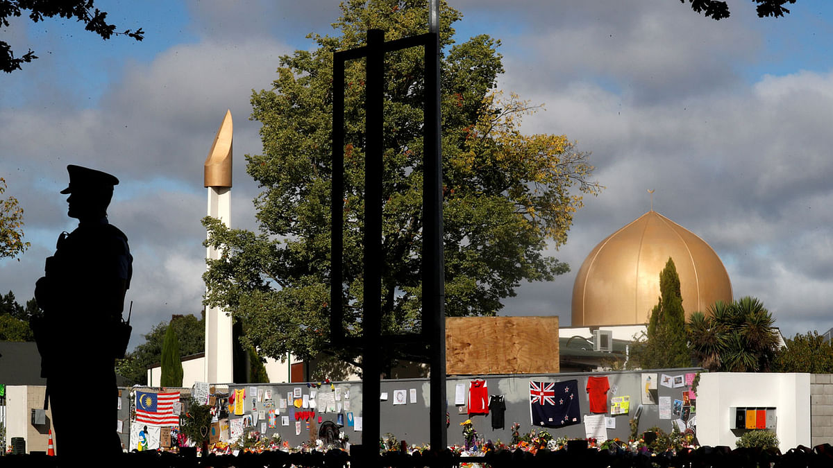 A police officer stands guard outside Al Noor mosque in Christchurch, New Zealand, on 22 March 2019. Reuters File Photo
